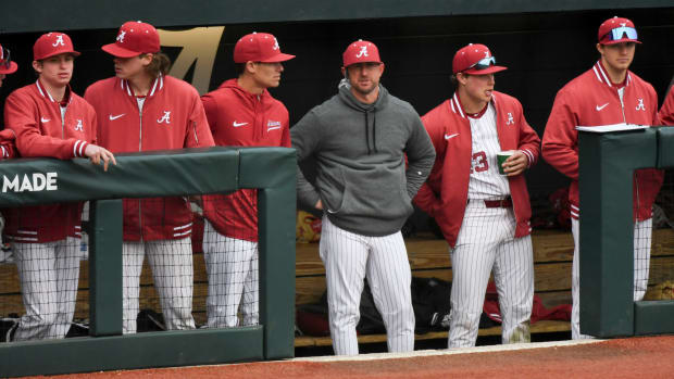 Feb 17, 2024; Tuscaloosa, Alabama, USA; New Alabama head baseball coach Rob Vaughn watches his team perform in the game with Manhattan at Sewell-Thomas Stadium Saturday.